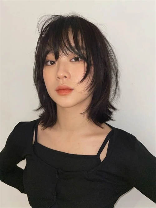 Choppy Layered Bob with Wispy Bangs.jpg
